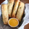 A Stage Stop menu favorite is our Philly Cheesesteak Egg Rolls with four in a basket served with cheese sauce.