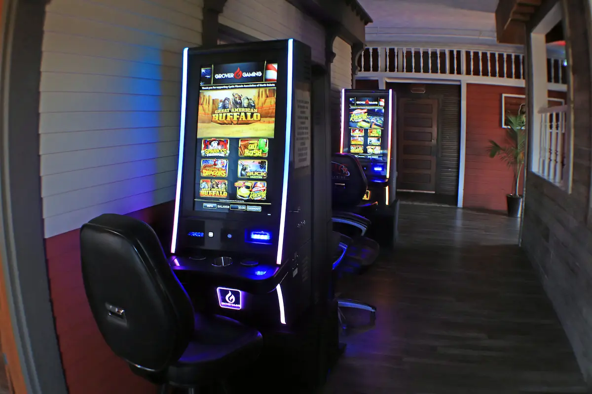 Electronic gambling machines in a wide hallway on the upper level of Stage Stop
