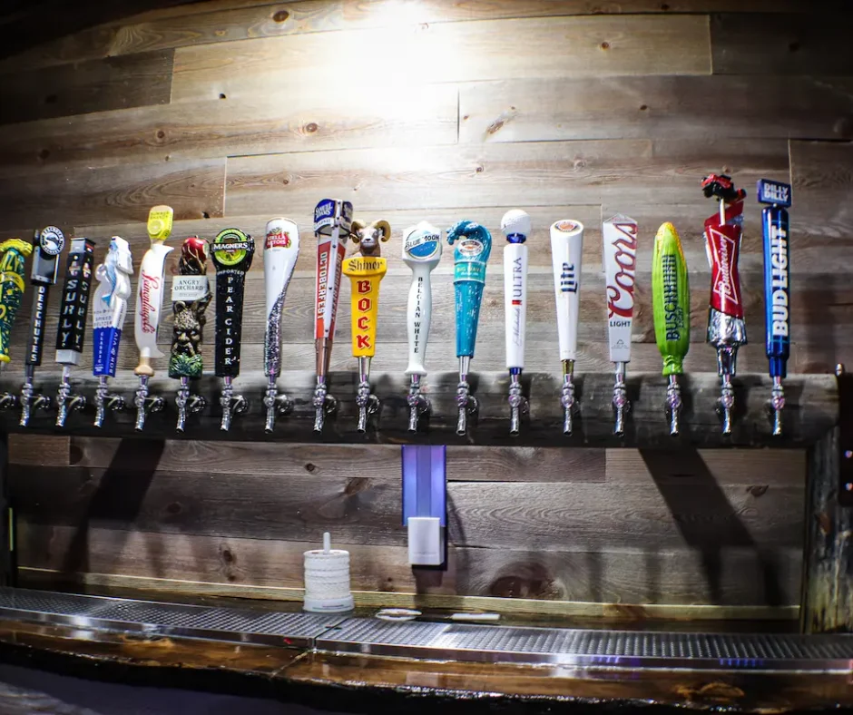 Front view of the 19 beers on tap at the main bar on the main level of Stage Stop