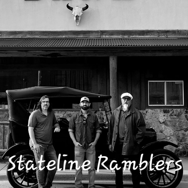 Stateline Ramblers are pictured in an old western scene with three male band members.